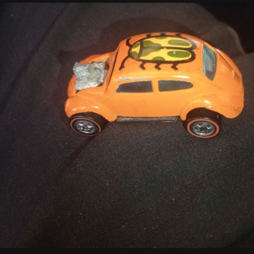 Orange and Green Die-Cast Volkswagen Beetle Toy Car